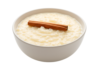 Creamy rice pudding topped with a cinnamon stick served in a white bowl on a black background