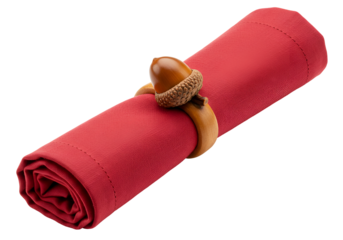 Creative imaginative table setting with a red napkin, acorn ring and forest-themed decor on a