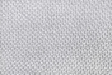 White grey fabric cloth texture for background, natural textile pattern.