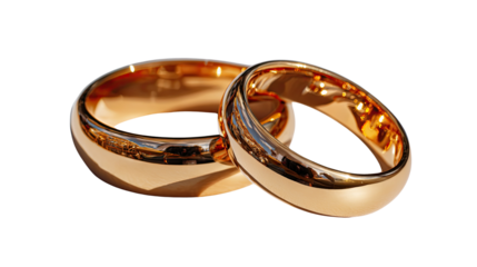 Eternal Bond: The timeless symbol of commitment, a pair of gleaming gold wedding rings intertwined, reflecting enduring love and the promise of a shared future.