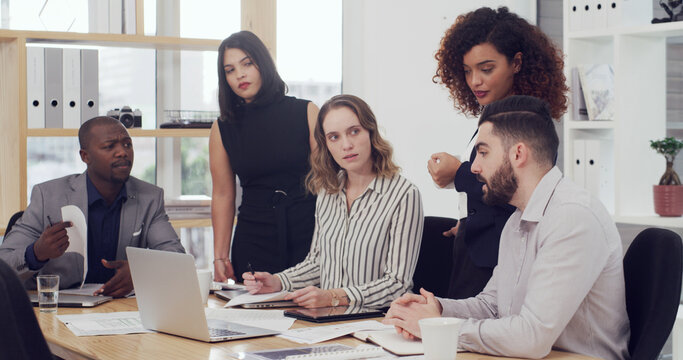 Laptop, talking and research with business people in office for court case, lawyer or evidence review. Attorney report, settlement documents and planning with employees in law firm for trial briefing