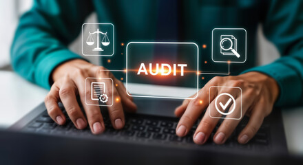 Hands typing on a laptop with digital audit icons floating above, representing financial review, compliance, and business analysis
