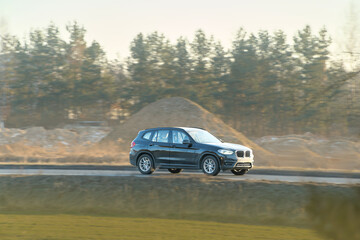 Fototapeta premium Suburban Luxury drive with forest and rocks view