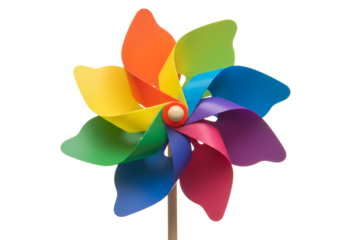 Colorful Pinwheel Toy with Multiple Blades Blowing in the Wind Against Black Background