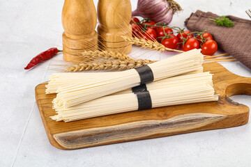 Raw dry white wheat noodles