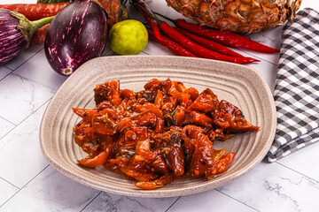 Asian cuisine - pork in chili sauce