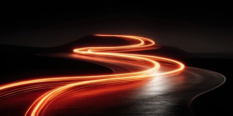 Winding road at night, light trails