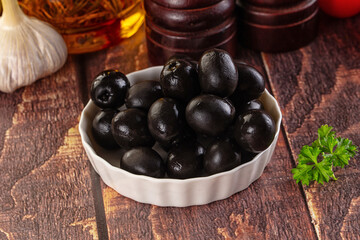 Mediterranean marinated Black olives in the bowl