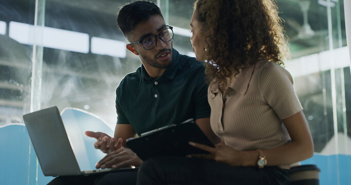 People, programmer and help with laptop in office for coding, software update and testing program. Staff, reading and pc for IT collaboration, troubleshooting website and problem solving of debugging