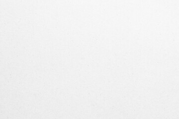 White recycled craft paper texture as background. Grey paper texture, Old vintage page or grunge vignette of old newspaper. Hardboard with copy space for text.