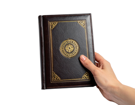 Brown Leather Journal With Gold Compass Design Held By A Person'S Hand Book isolated on transparent background. PNG die-cut for advertising
