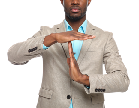 Man In Suit Forming Time Out Signal With Hands Showing Patience And Pause Tisolated on transparent background. PNG die-cut for advertising - Powered by Adobe