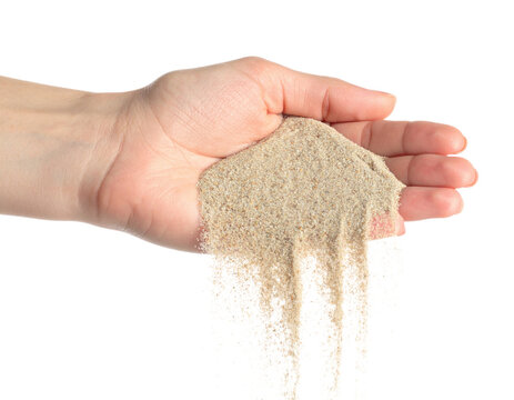 Human Hand Holding Fine Sand Pouring Down Falling isolated on transparent background. PNG die-cut for advertising - Powered by Adobe