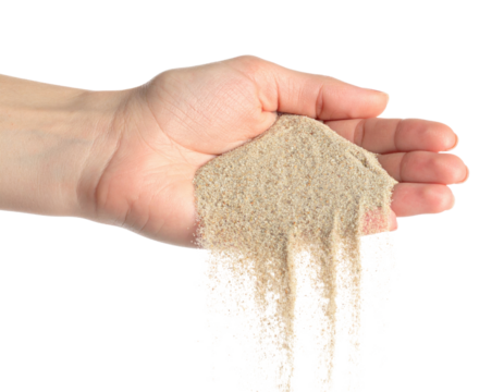 Human Hand Holding Fine Sand Pouring Down Falling isolated on transparent background. PNG die-cut for advertising