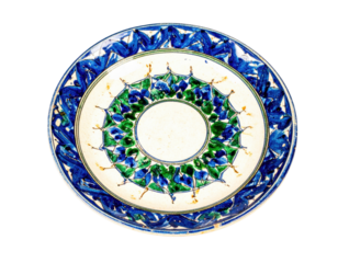 Ornate Ceramic Plate With Blue And Green Floral Patterns Decorative isolated on transparent background. PNG die-cut for advertising