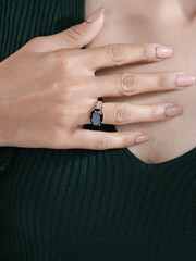 woman's elegant finger ring with Black Stone