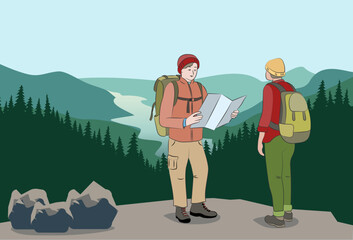 Two hikers on a mountain top looking for new routes on the map.