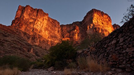 Fototapeta premium Canyon walls ablaze at dawn