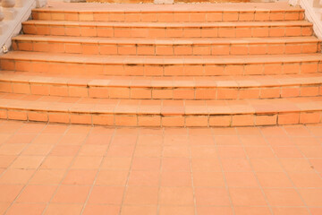 Red brick staircase in rooftopwith tree and garden,stair in school or office,cafe,Stairs made of brick close up,sitting,walkway,summer vacation rest in holiday,space for text..