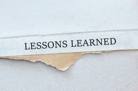 LESSONS LEARNED text on white background	