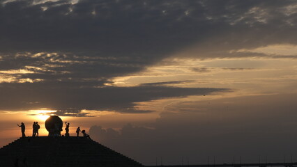 silhouette of a people on sunset background