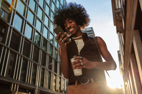 City life with smartphone-driven man - Powered by Adobe