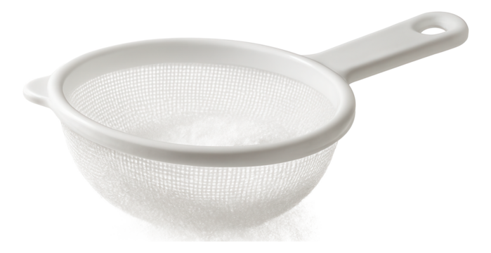 A subtle sugar haze settling from a plastic mesh sieve.