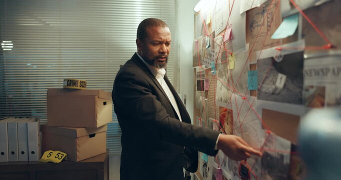 Man, crime board or night with investigation for murder mystery, police case or tracking suspect. Male person, officer or detective working late with map for evidence or information on serial killer