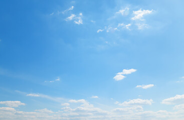 A beautiful blue sky with soft white clouds for abstract background