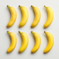 Eight ripe bananas arranged on white background, studio shot, food photography, healthy eating