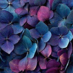 Textured background made of densely packed hydrangea petals in blues, pinks, and purples