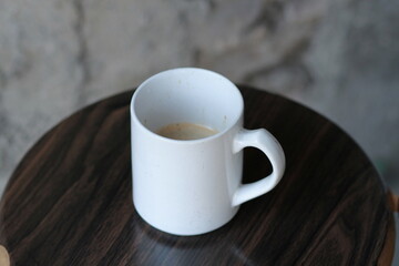 cup of coffee on wooden table