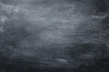 Fototapeta premium Textured dark gray surface with subtle shading