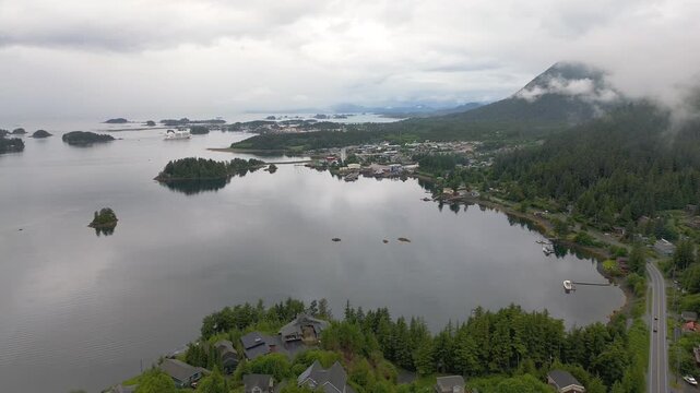 aerial pulling out from sitka alaska over waterway