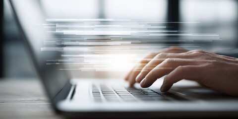 focused hands typing on laptop keyboard with soft glow creating cozy workspace atmosphere for productivity and late night work sessions