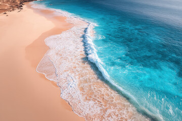 aerial view of pristine sandy beaches and crystal clear waters of ocean highlighting untouched nature