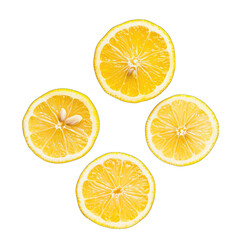 Four lemon slices arranged in a cross pattern, displaying the fruit's interior