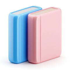 Two colorful books, side-by-side, on a white background.  The books have smooth, rounded edges and a slightly glossy finish.  One book is light blue, the other a pale pink.  