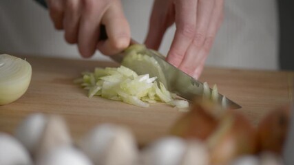 Mastering the art of chopping vegetables in a serene kitchen setting during a cooking class
