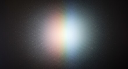 Obraz premium Soft rainbow light effect with lens flare and bokeh on a dark background, abstract background