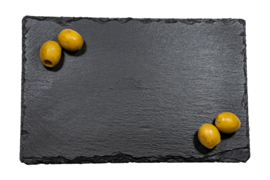 fotografía en formato png de cuatro oliva rellena de anchoas dos en cada esquina sobre un plato de pizarra negra