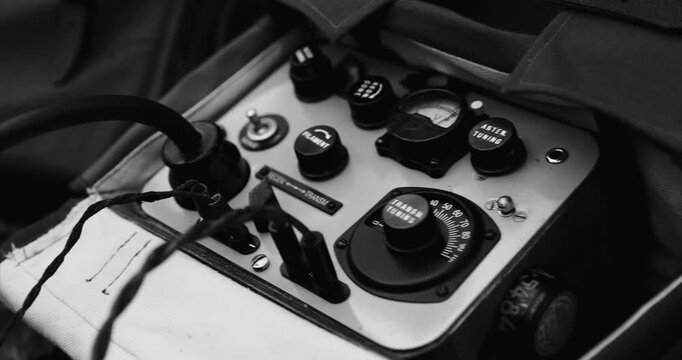 Historical Re-enactment Black And White Video. Russian Soviet Infantry Red Army Soldier In World War II using Russian Soviet Portable Radio Transceiver In Trench Entrenchment In Spring Autumn Forest