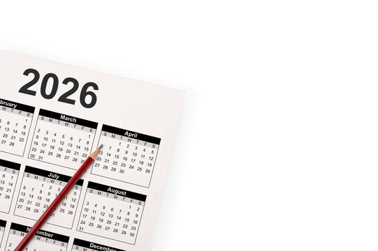 Closeup of 2026 calendar with red pencil for scheduling business appointments, holiday events, and marking important new year dates - Powered by Adobe