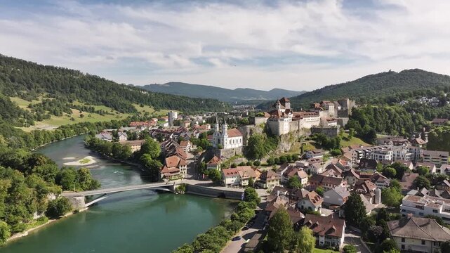 Aarburg castle and Aare river in Switzerland, drone view with summer green hills, medieval town and scenic alpine views.