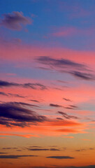 Fototapeta premium Vibrant sunset colors blend across the evening sky in serene beauty