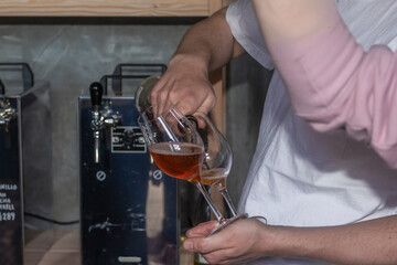 Pouring red and white wine at a cafe 2021