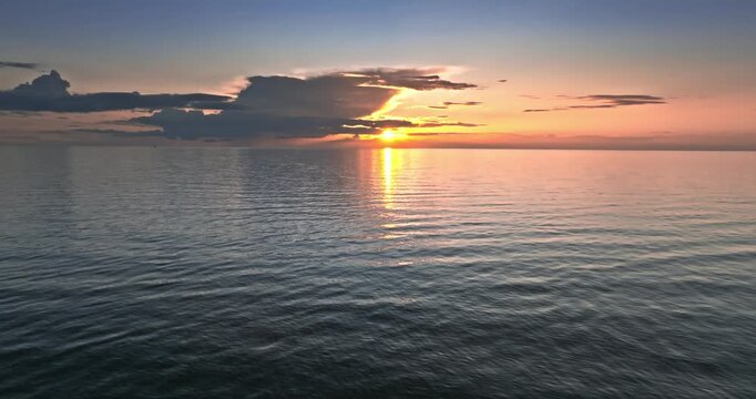 Calm golden sunset over Batlic sea in Poland.