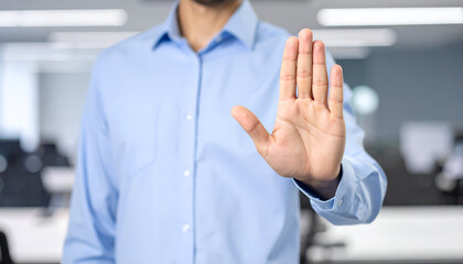 Businessman Making Stop Gesture with Raised Hand