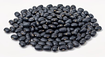Uncooked Black Beans in a Gentle Scatter on White Background