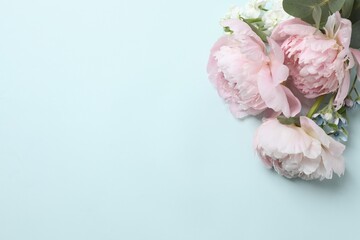 Top view of beautiful pink peonies, space for text